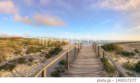 Wooden Boardwalk Leading to the Atlantic Coast at Furadouro Beach in Ovar Portugal 140037277