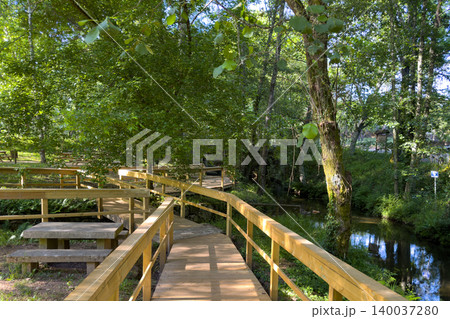Wooden Boardwalk Along a Stream in Passadicos do Rio Uima Wooden Boardwalk Along a Stream in Passadicos do Rio Uima 140037280