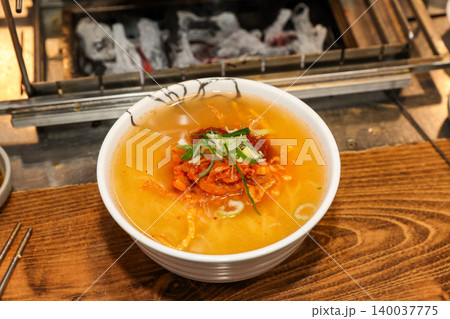 Bowl of Spicy Corn Noodle Soup at Asian Barbecue Restaurant Bowl of Spicy Corn Noodle Soup at Asian Barbecue Restaurant 140037775