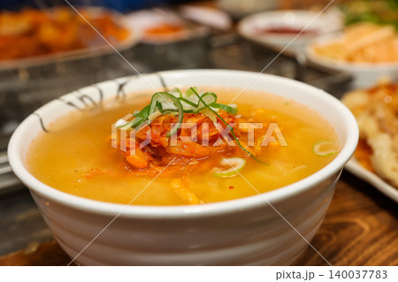 Bowl of Spicy Corn Noodle Soup at Asian Barbecue Restaurant Bowl of Spicy Corn Noodle Soup at Asian Barbecue Restaurant 140037783
