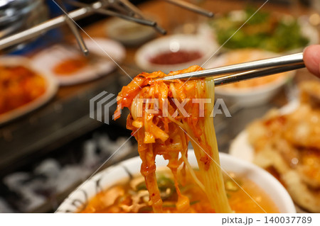 Bowl of Spicy Corn Noodle Soup at Asian Barbecue Restaurant Bowl of Spicy Corn Noodle Soup at Asian Barbecue Restaurant 140037789