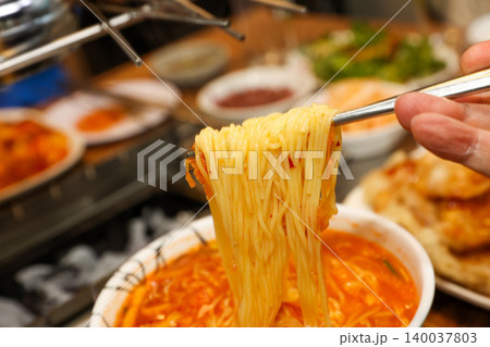 Bowl of Spicy Corn Noodle Soup at Asian Barbecue Restaurant Bowl of Spicy Corn Noodle Soup at Asian Barbecue Restaurant 140037803