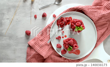 Top View of Raspberry Chia Pudding with Fresh Mint and Berries 140038173