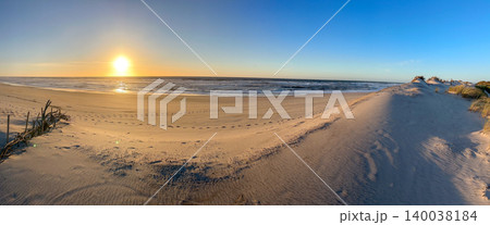 Panoramic Sunset over Sand Dunes at Furadouro Beach in Ovar Portugal Panoramic Sunset over Sand Dunes at Furadouro Beach in Ovar Portugal 140038184