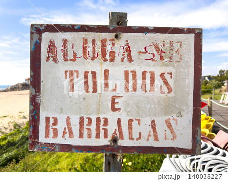 Weathered Portuguese Beach Sign for Awning and Hut Rentals Weathered Portuguese Beach Sign for Awning and Hut Rentals 140038227