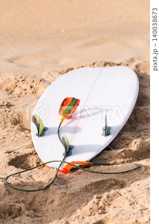 Surfboard on beach 140038673
