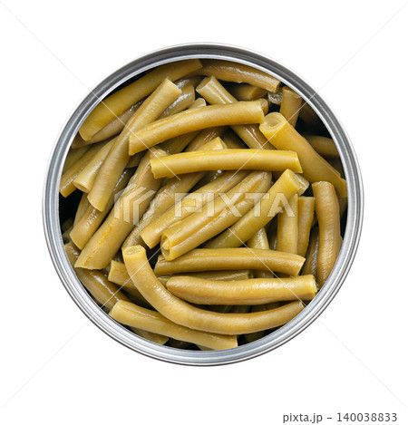 Canned cut green beans in open tin can. Trimmed, young green bean pods, sliced crosswise into uniform pieces, pressure-cooked and sealed in water-based canning. Isolated, close-up, from above. Photo. Canned cut green beans in open tin can. Trimmed, young green bean pods, sliced crosswise into uniform pieces, pressure-cooked and sealed in water-based canning. Isolated, close-up, from above. Photo. 140038833