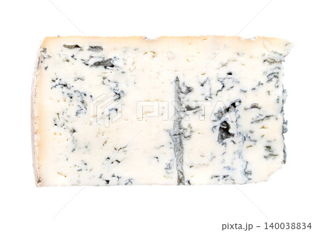 Slice of Gorgonzola Piccante, Italian blue cheese made from cow's milk, with soft and crumbly texture, and quite salty taste, with a so called bite from blue-green veining. Isolated from above. Photo Slice of Gorgonzola Piccante, Italian blue cheese made from cow's milk, with soft and crumbly texture, and quite salty taste, with a so called bite from blue-green veining. Isolated from above. Photo 140038834