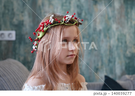 Fashion accessory girl with a beautiful handmade wreath on her head Fashion accessory girl with a beautiful handmade wreath on her head 140039277