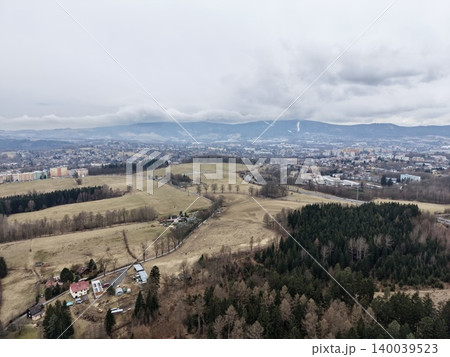 Scenic view from hillside village. Majestic high perspective showing rural land and small community 140039523
