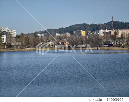 Vivid waterside neighborhoods. Vivid pastel facades on quiet waterfront residential complexes Vivid waterside neighborhoods. Vivid pastel facades on quiet waterfront residential complexes 140039964
