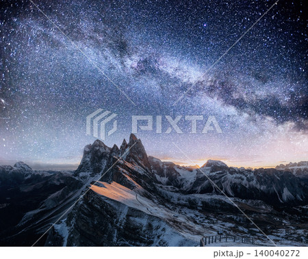 Seceda mountain, winter night scene of majestic nature, beautiful touristic place. Starry sky and milky way and galaxy landscape 140040272