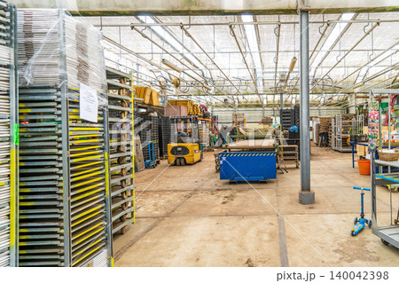 warehouse interior with shelves, pallets and boxes warehouse interior with shelves, pallets and boxes 140042398