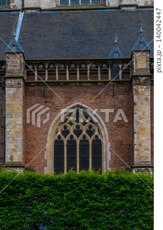 Window in medieval style with colored glasses. Window in medieval style with colored glasses. 140042447