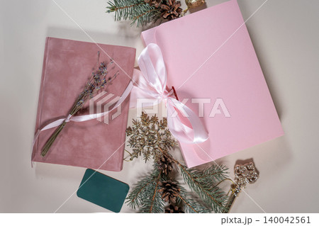 Beautiful gift pink cardboard box stars Christmas balls on beige background top view Flat lay. New Year presents Festive decorations 2024 celebration. Merry Christmas Happy Holidays card Beautiful gift pink cardboard box stars Christmas balls on beige background top view Flat lay. New Year presents Festive decorations 2024 celebration. Merry Christmas Happy Holidays card 140042561