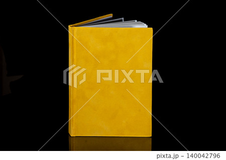 close up of a blank velour fluffy notebook on black background with clipping path close up of a blank velour fluffy notebook on black background with clipping path 140042796
