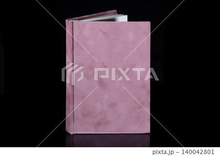 close up of a blank velour fluffy notebook on black background with clipping path close up of a blank velour fluffy notebook on black background with clipping path 140042801