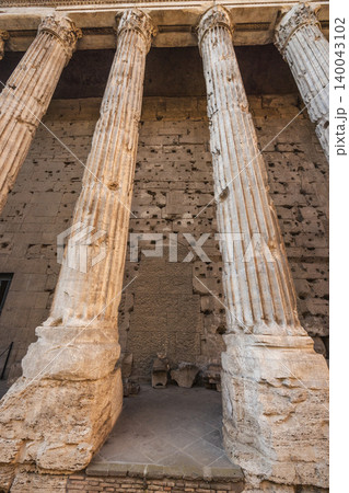 Ancient marble columns of the Temple of Antoninus and Faustina in Roman Forum Rome Italy Ancient marble columns of the Temple of Antoninus and Faustina in Roman Forum Rome Italy 140043102