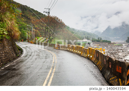 Reopened Mountain Road Along Damaged River Reopened Mountain Road Along Damaged River 140043594
