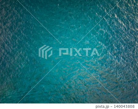 Sea surface aerial view,Bird eye view photo of blue waves and water surface texture Blue sea background Beautiful nature Amazing view sea background Sea surface aerial view,Bird eye view photo of blue waves and water surface texture Blue sea background Beautiful nature Amazing view sea background 140043808
