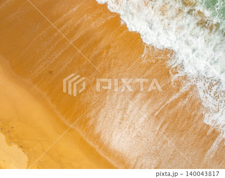 Bird eye view photo of beach sand background Bird eye view photo of beach sand background 140043817