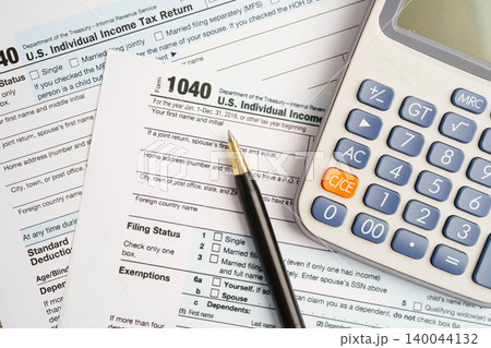 Tax form 1040 U.S. Individual Income Tax Return, business finance concept. Tax form 1040 U.S. Individual Income Tax Return, business finance concept. 140044132