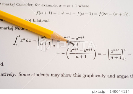 Pencil on mathematic formula exercise test paper in education school. Pencil on mathematic formula exercise test paper in education school. 140044134