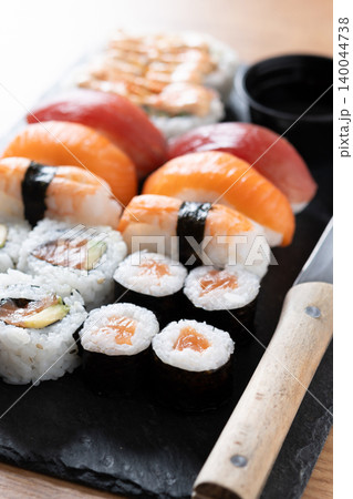 Assorted Sushi Selection and soy sauce on a Japanese restaurant table Assorted Sushi Selection and soy sauce on a Japanese restaurant table 140044738
