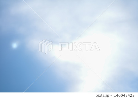 Cloudscape with clouds covering the sun under the blue sky. Nature scene, skyscape and cloudscape. Cloudscape with clouds covering the sun under the blue sky. Nature scene, skyscape and cloudscape. 140045428
