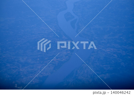High angle view of the skyscape and cityscape. The view of Japan from the airplane window. Flying over Japan, Asia. Travel and nature scene. 140046242