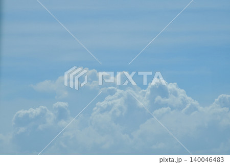 Big fluffy white clouds with the blue sky. Dramatic cloudscape. Nature scene. Nature background. Big fluffy white clouds with the blue sky. Dramatic cloudscape. Nature scene. Nature background. 140046483