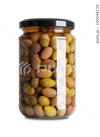 Taggiasca or Cailletier olives with stone, in brine, in glass jar with screw cap. Colorful mix of whole, unripe, cured green olives, and ripe, purple olives, preserved in a water-and-salt brine. Photo Taggiasca or Cailletier olives with stone, in brine, in glass jar with screw cap. Colorful mix of whole, unripe, cured green olives, and ripe, purple olives, preserved in a water-and-salt brine. Photo 140048239
