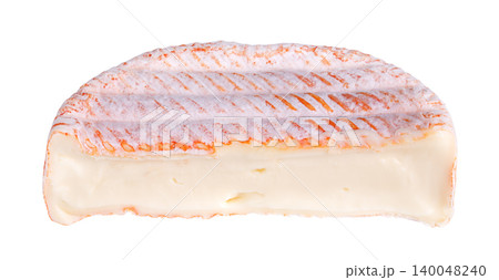 French soft cheese half with washed rind. Cheese made from cow milk featuring a washed, edible orange-red rind, parallel ridge pattern, and a creamy, slightly runny texture. Close-up, isolate. Photo French soft cheese half with washed rind. Cheese made from cow milk featuring a washed, edible orange-red rind, parallel ridge pattern, and a creamy, slightly runny texture. Close-up, isolate. Photo 140048240