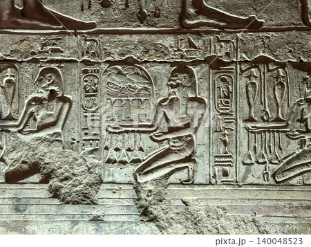Beautiful bas-reliefs and ancient hieroglyphs in the Temple of Seti I in Abydos, Egypt. Beautiful bas-reliefs and ancient hieroglyphs in the Temple of Seti I in Abydos, Egypt. 140048523