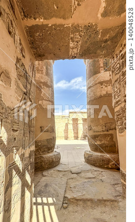 Medinet Habu, the mortuary temple of Ramesses III, located on the west bank of Luxor, Egypt. 140048528