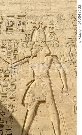 Beautiful bas-reliefs and ancient hieroglyphs from the mortuary temple of Ramesses III at Medinet Habu, Luxor, Egypt. 140048532