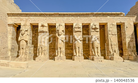 Medinet Habu, the mortuary temple of Ramesses III, located on the west bank of Luxor, Egypt. 140048536