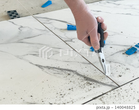 Grout seam cleaning 140048825