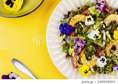 Shrimp and Garden Salad Decorated with Edible Flowers Shrimp and Garden Salad Decorated with Edible Flowers 140048903