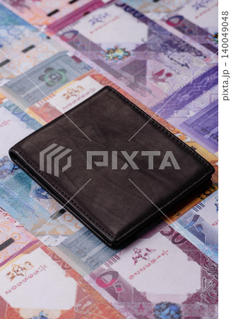 Qatar, Qatari riyal, paper money and coins, financing and commodity exchange, trade. Qatari currency Qatar, Qatari riyal, paper money and coins, financing and commodity exchange, trade. Qatari currency 140049048