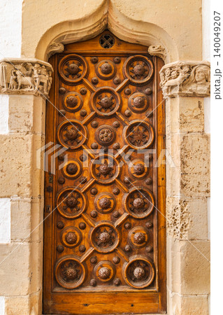 Ornate carved wooden door in Palau Maricel, Sitges Spain Ornate carved wooden door in Palau Maricel, Sitges Spain 140049207