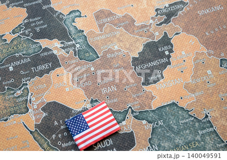 National flag of USA near Iran image on the world map background. Iran and USA conflict. Crisis and terrorism. 140049591