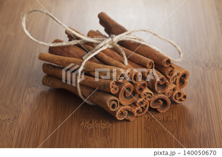 Cinnamon on a wooden floor. Cinnamon on a wooden floor. 140050670