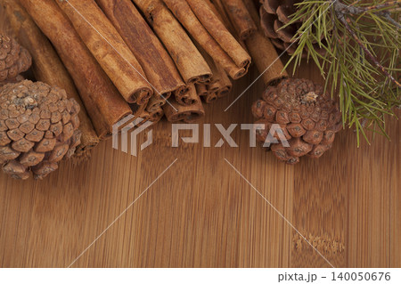Cinnamon on a wooden floor. 140050676