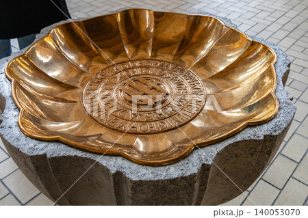 Decorative baptismal font inside Grundtvigs Church Decorative baptismal font inside Grundtvigs Church 140053070