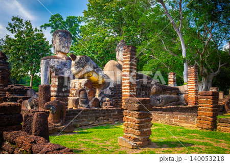 Landmark of Buddha image made of ancient bricks in the Kamphaeng Phet Historical Park, Thailand. Landmark of Buddha image made of ancient bricks in the Kamphaeng Phet Historical Park, Thailand. 140053218
