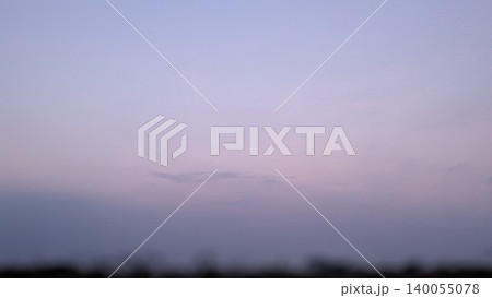 A serene sky photo with a soft gradient of colors, from a light purplish-pink at the top to a muted lavender at the bottom. A very small wisp of cloud is visible. The foreground is out of focus. A serene sky photo with a soft gradient of colors, from a light purplish-pink at the top to a muted lavender at the bottom. A very small wisp of cloud is visible. The foreground is out of focus. 140055078