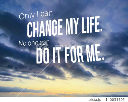 Inspirational quote "Only I can CHANGE MY LIFE. No one can DO IT FOR ME" overlaid on a dramatic dawn sky with dark, stormy blue clouds and a golden glow at the horizon. 140055505