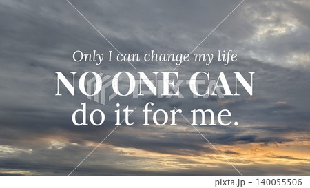 An empowering quote "Only I can change my life NO ONE CAN do it for me" is set against a backdrop of a cloudy, dramatic sky at dawn. The clouds are dark gray with a touch of orange from the sunrise. 140055506