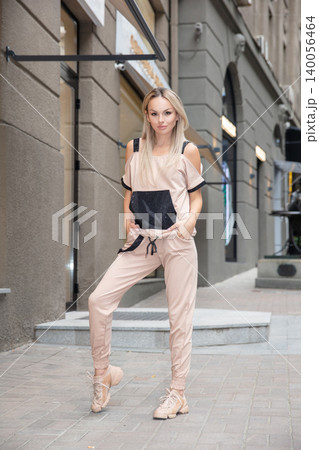 Beautiful woman dressed in sports suit 140056464